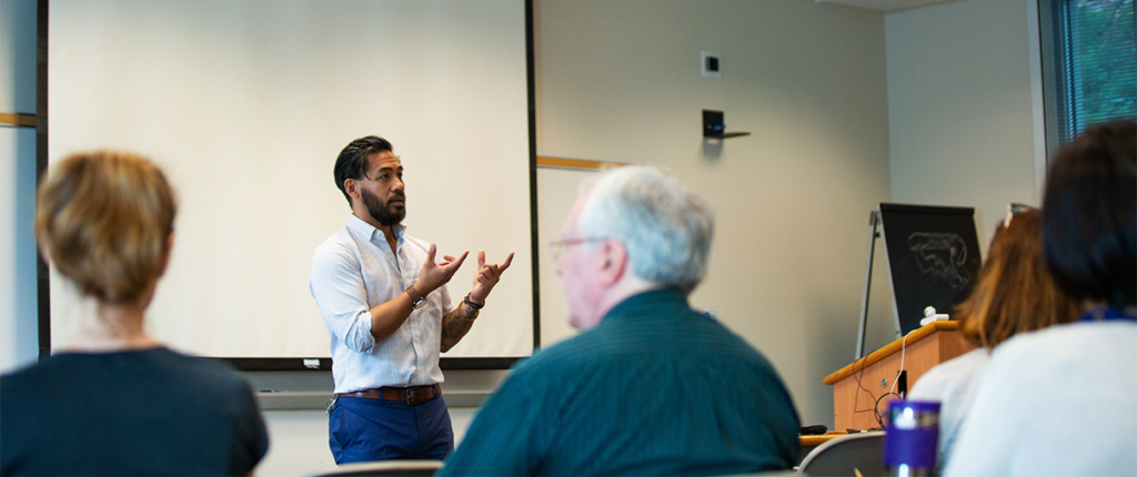 Dr. Tilan teaches a graduate class